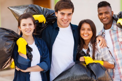 Professionals clearing a garden in Yiewsley